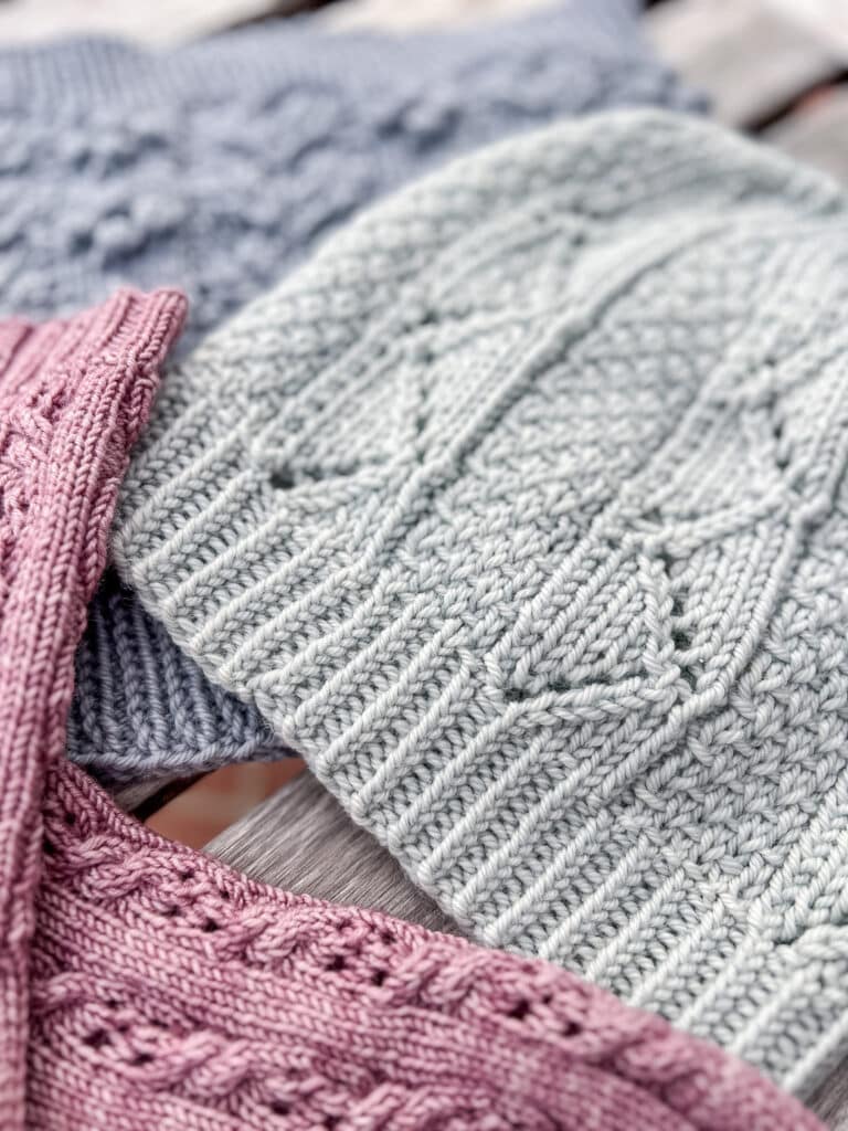 A close-up photo showing the 1 x 1 twisted ribbing on a gray-green handknit hat.